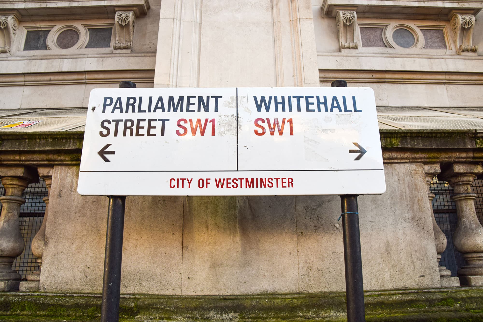 Road sign displaying direction to Parliament Street and Whitehall
